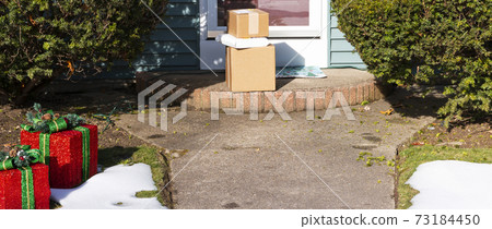 Packages left at front door in December during holidays Packages left at front door in December during holidays 73184450