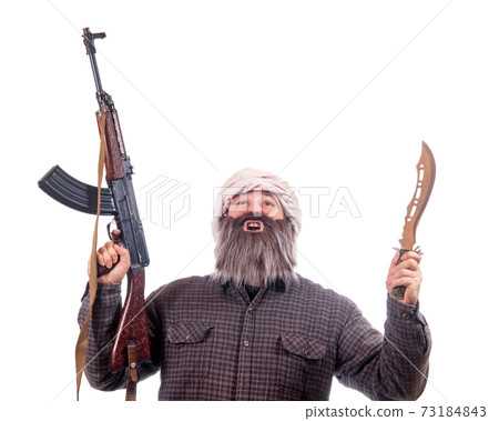 The bearded man armed with kalashnikov and knife isolated on a white background. . 73184843