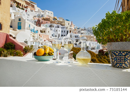 Wine and fruit for two on Santorini 73185144