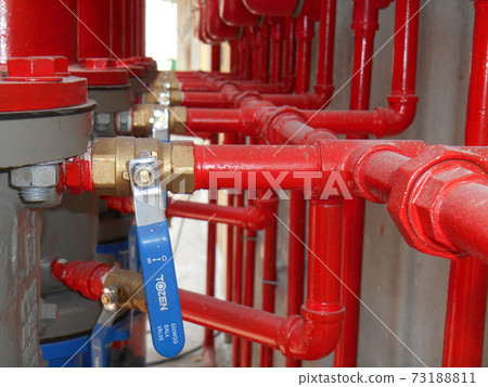 SERDANG, MALAYSIA -JULY 27, 2017: Alarm valve system. It was part of the building fire fighting system which is control and supply water to the sprinkler. 73188811