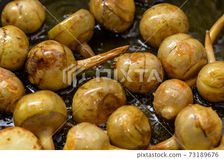 Deep-fried Kwai (during cooking) Deep-fried Kwai (during cooking) 73189676