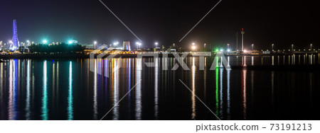 The Night panorama of Abu Dhabi from the sea, UAE The Night panorama of Abu Dhabi from the sea, UAE 73191213
