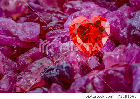 Red heart shaped diamond on pink stones Red heart shaped diamond on pink stones 73191563