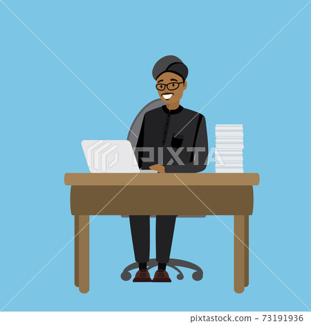 Arabic or indian businessman working at a laptop 73191936