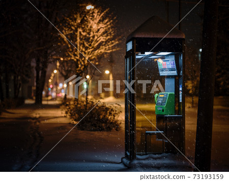 Public phone at night Public phone at night 73193159