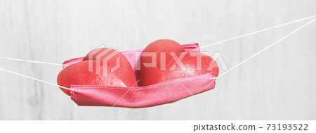 Two red hearts in a face mask hammock 73193522