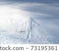 A humanoid who fell into the snow during a snowshoe hike in Kamikochi 73195361