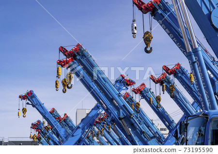 Crane car boom in a forest 73195590