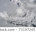 A humanoid who fell into the snow during a snowshoe hike in Kamikochi 73197205