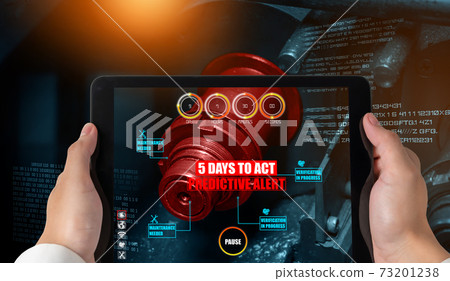 Engineer use augmented reality software in smart factory production line 73201238