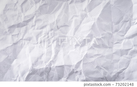 Close-up white crumpled paper texture background. Close-up white crumpled paper texture background. 73202148