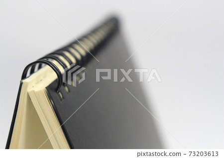 book with ring spine on white background book with ring spine on white background 73203613