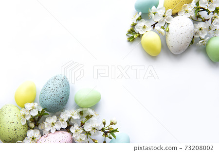 Colorful Easter eggs with spring blossom flowers 73208002
