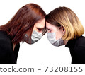 Girl and woman in medical protective mask 73208155