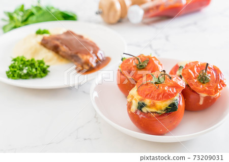 baked tomatoes stuffed with cheese and spinach baked tomatoes stuffed with cheese and spinach 73209031
