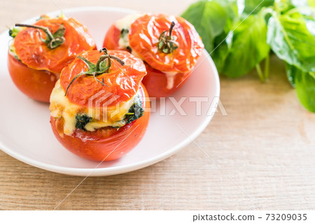 baked tomatoes stuffed with cheese and spinach baked tomatoes stuffed with cheese and spinach 73209035