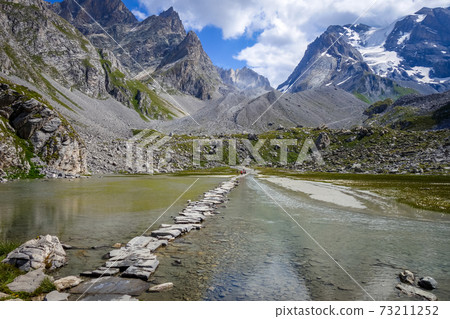 Cow lake, Lac des Vaches, in Vanoise national Park, France 73211252
