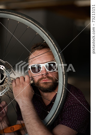 beard man posing in the street, fashion style, vintage glasses, sunglasses, mustache beard man posing in the street, fashion style, vintage glasses, sunglasses, mustache 73213151