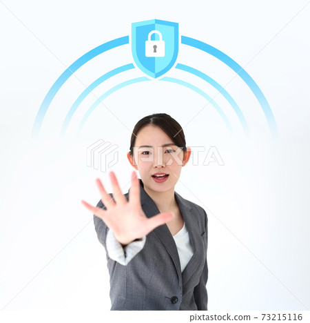 Image of a business woman guarding and blocking 73215116
