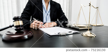 Professional women lawyers work at a law office There are scales, Scales of justice, judges gavel, and litigation documents. Concepts of law and justice Professional women lawyers work at a law office There are scales, Scales of justice, judges gavel, and litigation documents. Concepts of law and justice 73216130