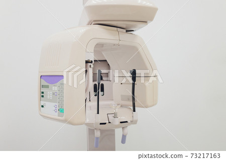 X-ray machine in the dental clinic. Selective focus. X-ray machine in the dental clinic. Selective focus. 73217163