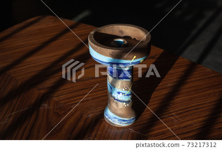 part of the hookah, modern design, on a background. part of the hookah, modern design, on a background. 73217312