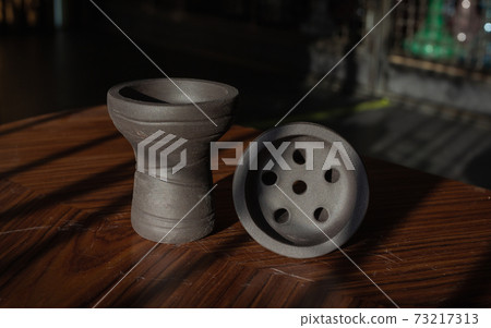 part of the hookah, modern design, on a background. part of the hookah, modern design, on a background. 73217313