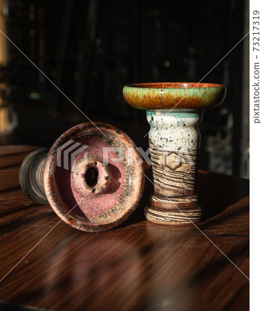part of the hookah, modern design, on a background. part of the hookah, modern design, on a background. 73217319