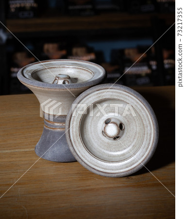 part of the hookah, modern design, on a background. part of the hookah, modern design, on a background. 73217355