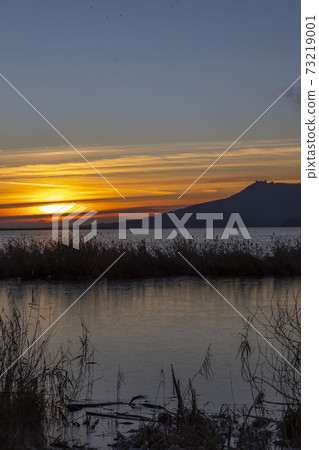 Nove Mlyny reservoir and Palava hills during sunrise in winter, Southern Moravia, Czech Republic 73219001