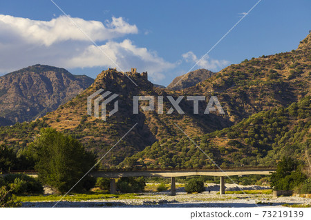 Castello Ruffo di Amendolea runs near Condofuri, Calabria region, Italy 73219139