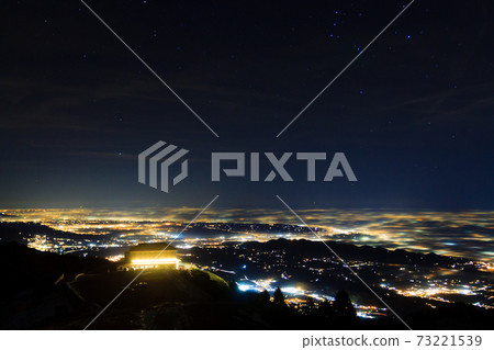 Plain illuminated partially covered by fog, soft lights Plain illuminated partially covered by fog, soft lights 73221539