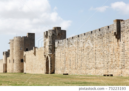 Historic towers and ramparts in the city of Aigues-Mortes, France 73223193