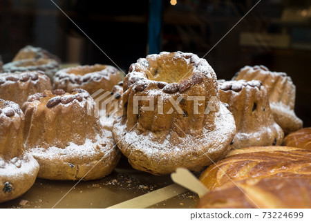 Closeup of traditional Kougelhopf in a pastry store Closeup of traditional Kougelhopf in a pastry store 73224699