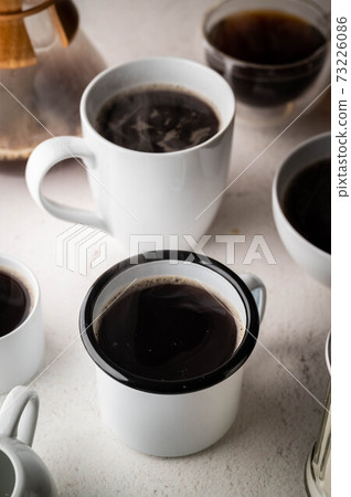 coffee mugs and cups on white background 73226086