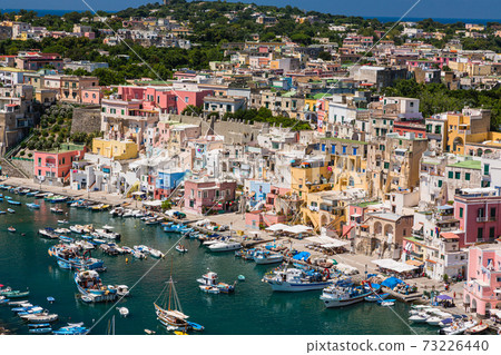 Corricella coast from the observation deck in the Terra Murata district of Procida, Italy Corricella coast from the observation deck in the Terra Murata district of Procida, Italy 73226440