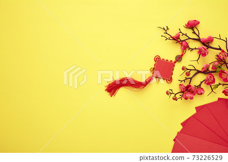 Chinese New Year decoration yellow background Chinese New Year decoration yellow background 73226529