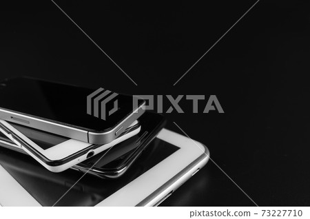 Stack of smartphones Stack of smartphones 73227710
