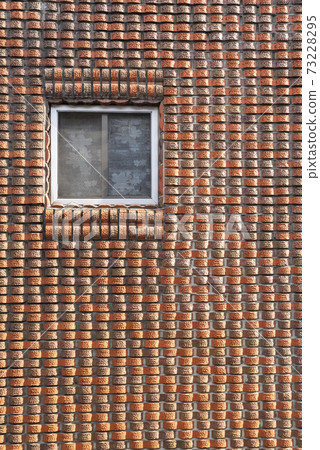 Red brick walls and small windows Red brick walls and small windows 73228295