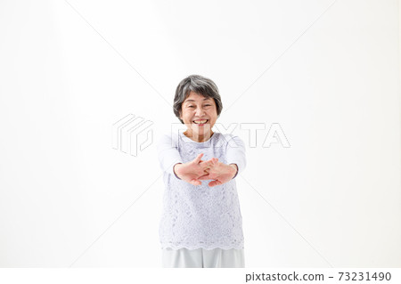 Senior woman stretching Senior woman stretching 73231490