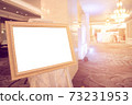 Blank Golden vintage photo frame at entrance wedding hall..Blank photo frame with copy space at hotel.Blank advertising billboard..Poster media template Ads display with copy space, 73231953