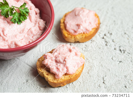 A bowl and crostini with tarama sause A bowl and crostini with tarama sause 73234711