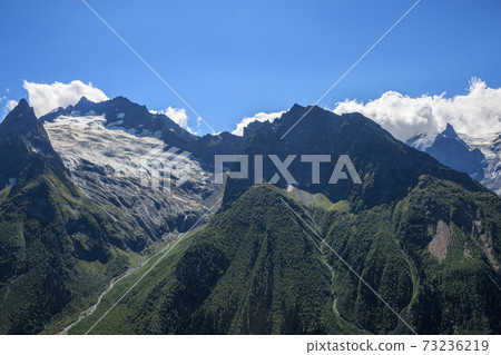 Closeup view mountains scenes in national park Dombai, Caucasus, Russia, Euro Closeup view mountains scenes in national park Dombai, Caucasus, Russia, Euro 73236219