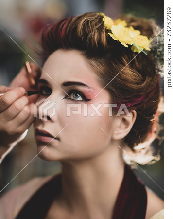 Portrait of a beautiful woman in beauty salon 73237289