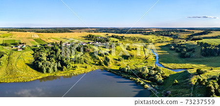 Aerial view of Maloe Gorodkovo, a typical village on the Central Russian Upland, Kursk region of Russia Aerial view of Maloe Gorodkovo, a typical village on the Central Russian Upland, Kursk region of Russia 73237559