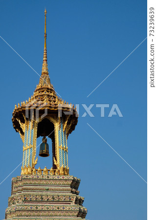 A small tower with a bell from the Temple of the Emerald Buddha. A small tower with a bell from the Temple of the Emerald Buddha. 73239639