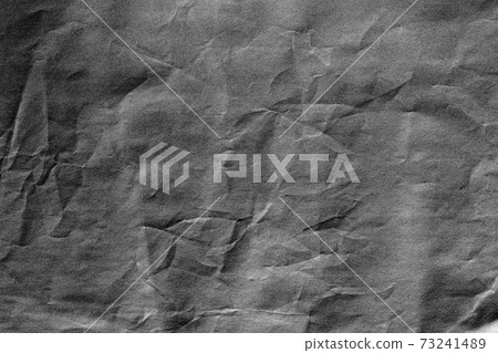 Dark grey crumpled background paper texture Dark grey crumpled background paper texture 73241489