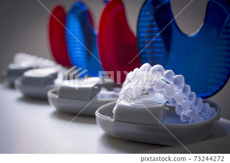 Boxes with plastic invisible orthodontics Boxes with plastic invisible orthodontics 73244272