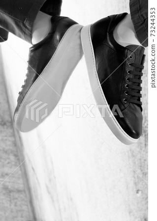 Mannequin foot of man in walking position 73244353