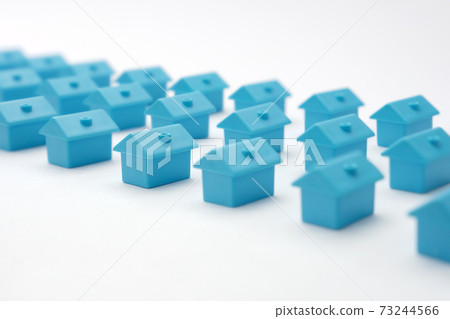Real estate in cottage village. Home owner association. Rows toy houses. Miniature blue houses arranged in three rows. Miniature toy buildings. Many small houses. Miniature homes with property market Real estate in cottage village. Home owner association. Rows toy houses. Miniature blue houses arranged in three rows. Miniature toy buildings. Many small houses. Miniature homes with property market 73244566
